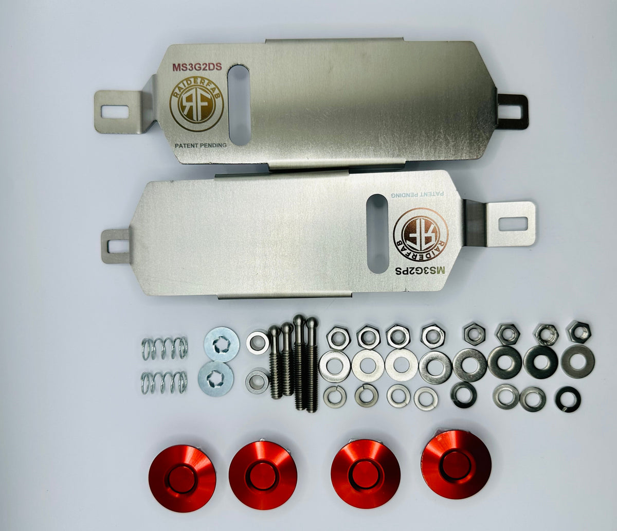 RaiderFab second-generation Mazda3 bumper kit with two brackets, four red latches and mounting hardware.