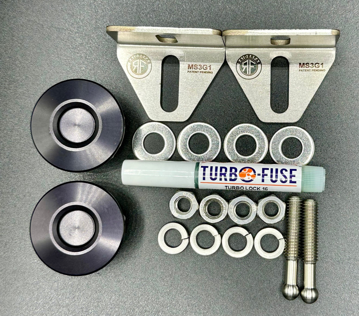 RaiderFab Mazda6 fenderwell kit with two black latches, two brackets, threadlocker and mounting hardware.