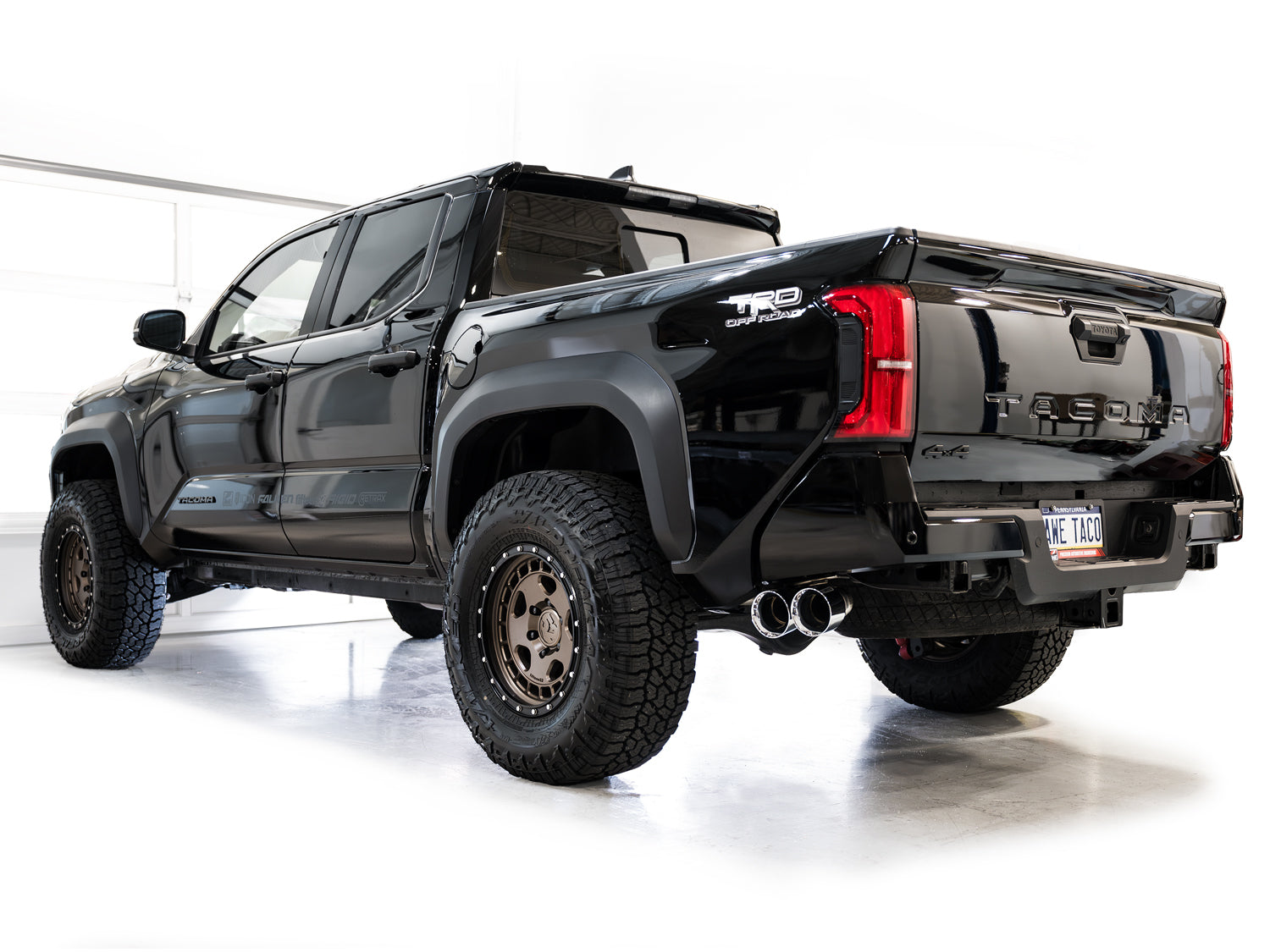 AWE 0FG Exhaust for 4th Gen Toyota Tacoma - Dual Chrome Silver Tips