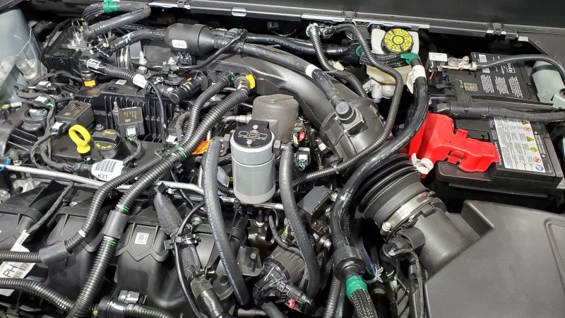 J&L 19-24 Ford/Lincoln SUVs & Trucks w 2.0 EcoBoost Driver Side Oil Separator 3.0 - Clear An-Oil Separators-Grocery Getter Performance