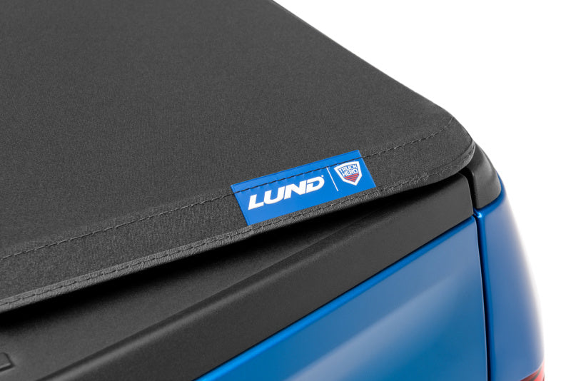 Lund 02-17 Dodge Ram 1500 (5.5ft. Bed) Genesis Elite Tri-Fold Tonneau Cover - Black-Tonneau Covers - Soft Fold-Grocery Getter Performance