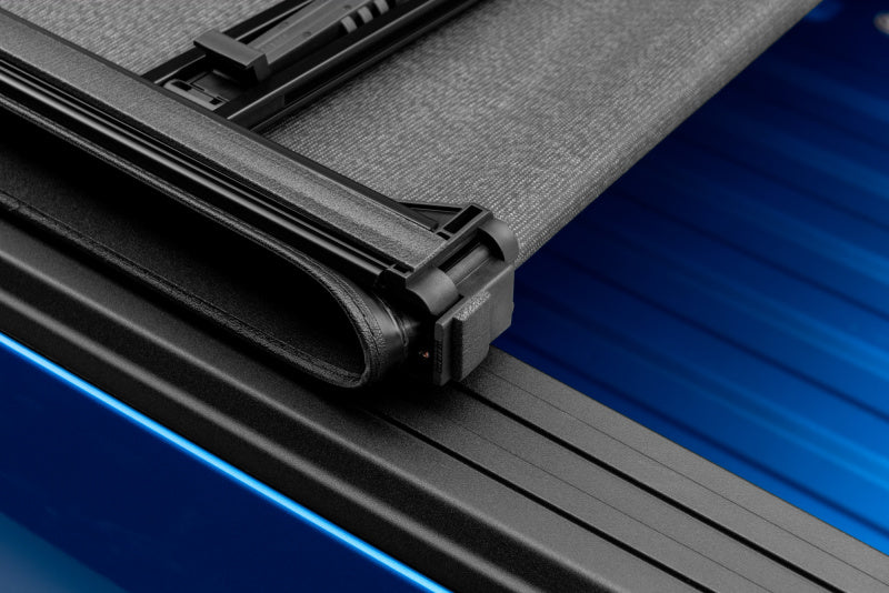 Lund 02-17 Dodge Ram 1500 (5.5ft. Bed) Genesis Elite Tri-Fold Tonneau Cover - Black-Tonneau Covers - Soft Fold-Grocery Getter Performance