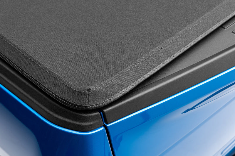 Lund 02-17 Dodge Ram 1500 (5.5ft. Bed) Genesis Elite Tri-Fold Tonneau Cover - Black-Tonneau Covers - Soft Fold-Grocery Getter Performance